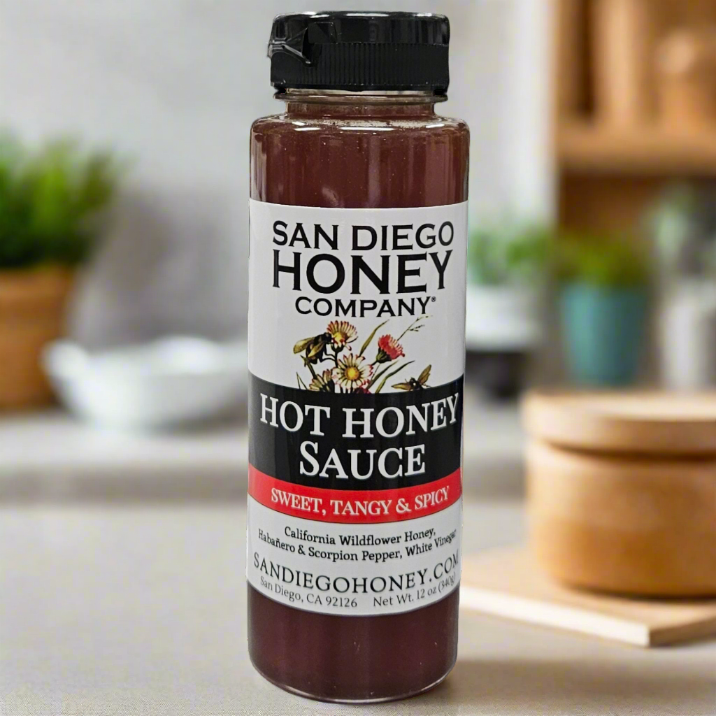 Try our Hot Honey Sauce — spicy, artisanal honey with a kick. Perfect on pizza, wings, tacos & more. Small-batch San Diego honey with bold flavor.